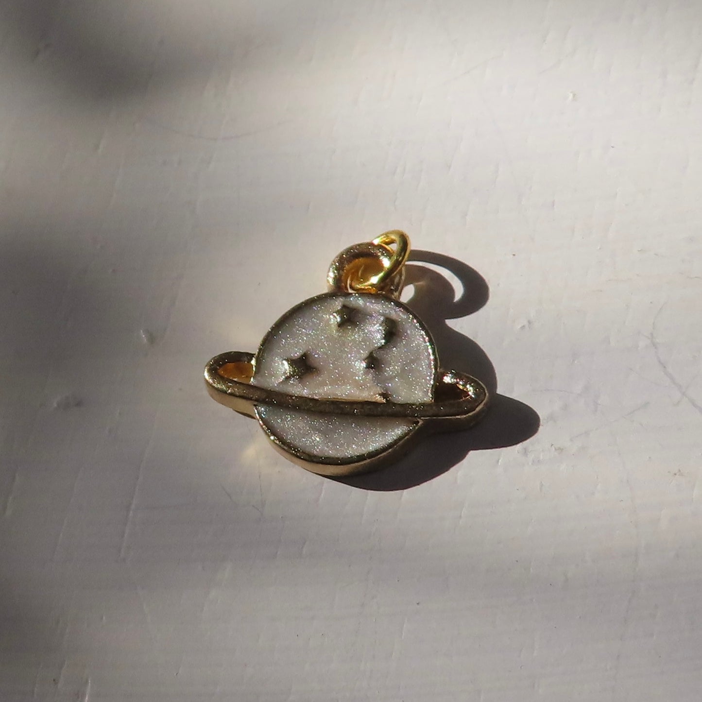 Bedel | emaille planeet 13x15 mm